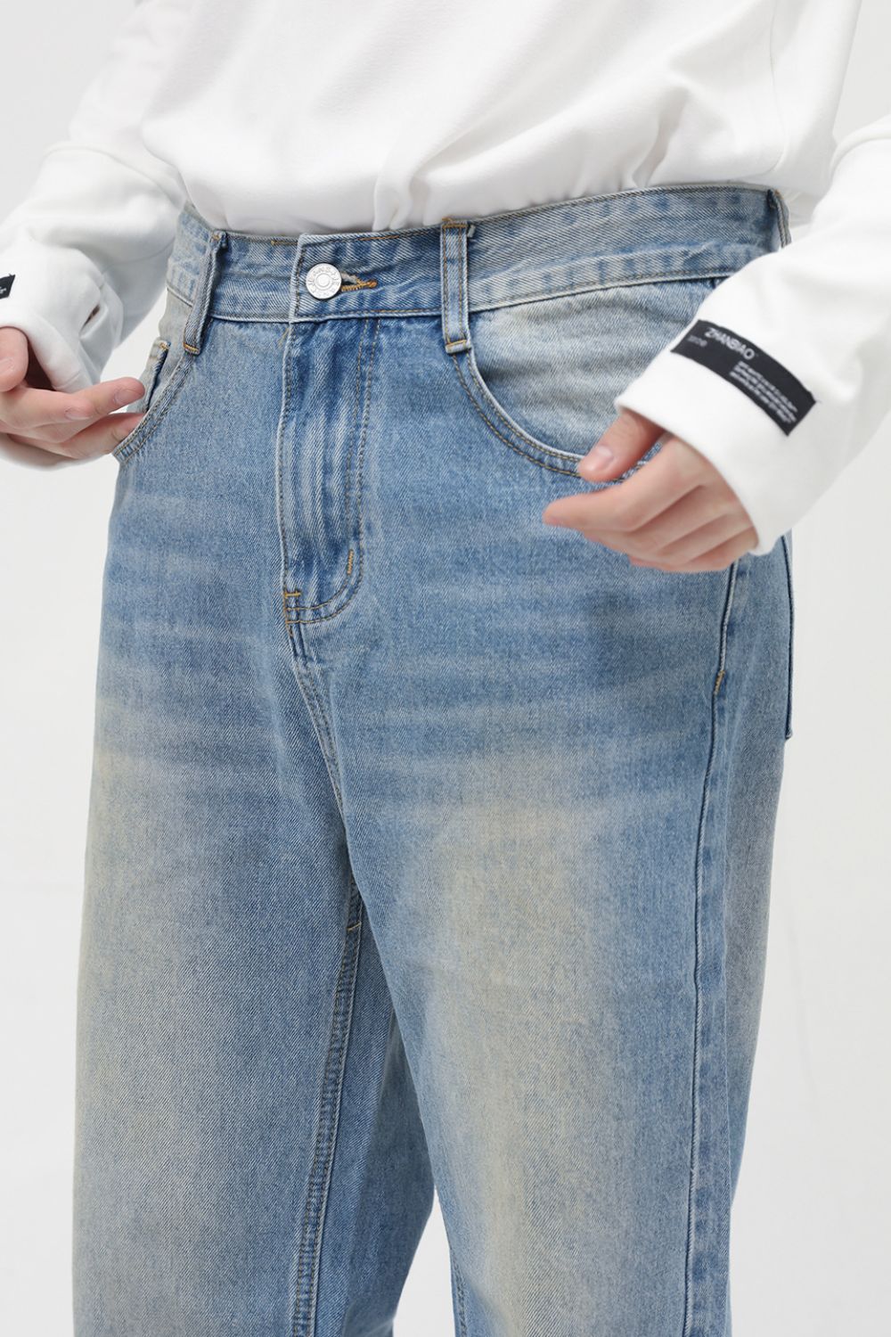 Washed Mid Rise Jeans with Pockets
